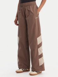 Adidas Spodnie dresowe Blocked Washed KD8790 Brązowy Loose Fit. Brązowe spodnie dresowe Adidas, l, bez wzorów, z dresówki. Za 349.99 zł.