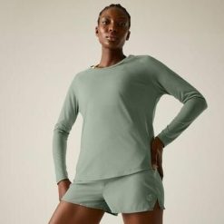 Damska koszulka z długim rękawem do biegania Nimble. Zielone bluzki Dare 2b, bez wzorów, z lyocellu, sportowe, bez kołnierzyka, bez ramiączek. Za 159.99 zł.