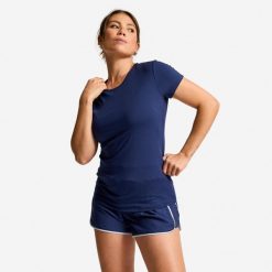 Koszulka fitness damska Domyos krótki rękaw. Niebieskie koszulki sportowe DOMYOS, bez wzorów, z elastanu, bez ramiączek, na fitness i siłownię. Za 34.99 zł.