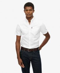 Superdry Koszula Oxford krótkiego rękawa z bawełny organicznej. Białe koszule Superdry, m, bez wzorów, z bawełny, casualowe, bez kołnierzyka, bez ramiączek. Za 279.65 zł.