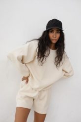 Bluza o kroju regular fit z dzianiny WAFLOWEJ w kolorze BRIGHT BEIGE - CODY. Brązowe golfy Marsala, uniwersalny, bez wzorów, z bawełny, bez ramiączek. Za 249.90 zł.