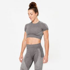 Koszulka fitness damska Domyos krótki rękaw. Czarne biustonosze DOMYOS, bez wzorów, z materiału. W wyprzedaży za 59.99 zł.
