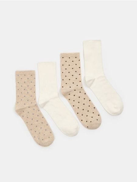 Skarpetki z bawełną 4 pack - kremowy. Białe skarpety Sinsay, bez wzorów, z bawełny. Za 15.99 zł.