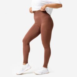 Legginsy fitness damskie Domyos Push Up. Brązowe legginsy DOMYOS, l, bez wzorów, z elastanu. Za 129.99 zł.