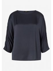 More & More Bluzka w kolorze czarnym rozmiar: 34. Czarne bluzki More & More, s, bez wzorów, z wiskozy, klasyczne, bez kołnierzyka, bez ramiączek. Za 87.81 zł.