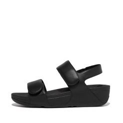 Damskie sandały z regulowanym skórzanym paskiem z tyłu FitFlop Lulu. Czarne sandały Flip Flop, bez wzorów, z materiału, eleganckie, bez obcasa, bez zapięcia. Za 413.70 zł.