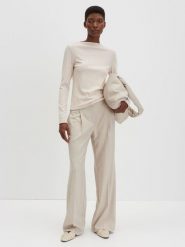 Someday Koszulka "Kelea" w kolorze kremowym rozmiar: 36. Brązowe bluzki someday., bez wzorów, bez kołnierzyka, bez ramiączek. Za 95.99 zł.