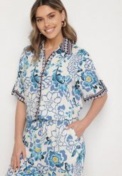 Niebieska Koszula z Wiskozy w Kwiatowy Wzór Milineira. Niebieskie koszule Born2be, l, bez wzorów, z jeansu, eleganckie, bez kołnierzyka, bez ramiączek. Za 79.99 zł.