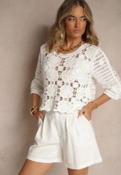 Biała Ażurowa Bluzka z Bawełny Nilonna. Białe bluzki Renee, w ażurowe wzory, z bawełny, eleganckie, bez kołnierzyka, bez ramiączek. Za 119.99 zł.
