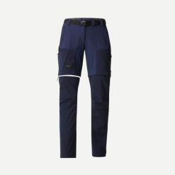 Spodnie trekkingowe damskie 2w1 Forclaz MT500. Niebieskie spodnie sportowe SIMOND, m, bez wzorów, z materiału, trekkingowe. Za 199.99 zł.