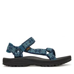 Sandały Teva. Niebieskie sandały Teva, bez wzorów, bez obcasa, na płaskiej podeszwie, bez zapięcia. Za 249.99 zł.