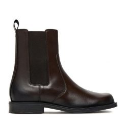 Sztyblety Gino Rossi. Brązowe botki Gino Rossi, bez wzorów, bez obcasa, na płaskiej podeszwie, bez zapięcia. Za 299.99 zł.
