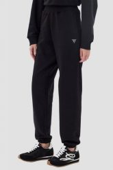 GUESS Czarne damskie spodnie dresowe Primula. Czarne spodnie dresowe Guess, s, z aplikacjami, z dresówki. W wyprzedaży za 239.99 zł.