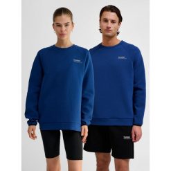 Bluza Hummel Tech. Niebieskie bluzy Hummel, na zimę, bez wzorów, z bawełny, bez kaptura. Za 286.50 zł.