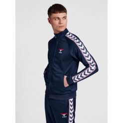 Bluza dresowa zapinana na zamek błyskawiczny Hummel IC Lerby Poly. Niebieskie bluzy Hummel, xs, bez wzorów, z dresówki, bez kaptura. Za 336.00 zł.