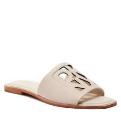 Klapki DKNY. Klapki DKNY, bez wzorów, bez obcasa. Za 379.99 zł.