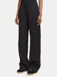 Guess Spodnie dresowe V6YB10 K4295 Czarny Regular Fit. Czarne spodnie dresowe Guess, m, z aplikacjami, z dresówki. Za 344.99 zł.
