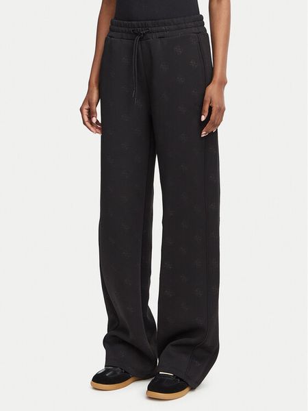 Guess Spodnie dresowe V6YB10 K4295 Czarny Regular Fit. Czarne spodnie dresowe Guess, m, z aplikacjami, z dresówki. Za 278.99 zł.