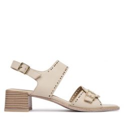 Sandały Caprice. Białe sandały Caprice, bez wzorów, bez obcasa, na słupku, bez zapięcia. Za 339.99 zł.