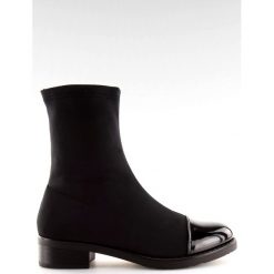 Botki elastyczne czarne NC780 Black. Czarne botki ButyModne, bez wzorów, z materiału, przed kolano, bez obcasa, na płaskiej podeszwie, bez zapięcia. W wyprzedaży za 119.00 zł.