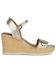 Geox Skórzane sandały "Ponza" w kolorze złotym na koturnie rozmiar: 39. Żółte sandały Geox, bez wzorów, z otwartym noskiem, bez obcasa, na koturnie, bez zapięcia. Za 331.95 zł.