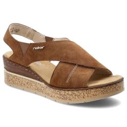 Sandały damskie Rieker, cholewka ze skóry ekologicznej z krzyżującymi się paskami na koturnie, brązowe, 63782-24. Brązowe sandały Rieker, bez wzorów, ze skóry ekologicznej, bez obcasa, na koturnie, bez zapięcia. Za 299.00 zł.