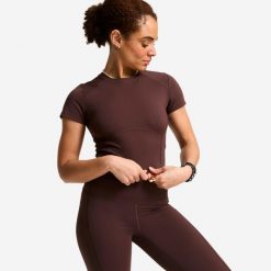 Koszulka fitness damska Domyos krótki rękaw. Brązowe bluzki DOMYOS, xl, bez wzorów, z elastanu, sportowe, bez kołnierzyka, bez ramiączek. Za 69.99 zł.