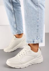 Beżowe Casualowe Buty Sportowe Sneakersy na Płaskiej Tłoczonej Podeszwie Velanitta. Brązowe obuwie sportowe Renee, z jeansu, bez zapięcia. Za 109.99 zł.