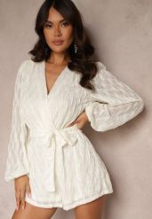 Jasnobeżowy Kombinezon Kopertowy z Tłoczeniami i Błyszczącymi Przeszyciami Wiązany w Talii Venirise. Brązowe sukienki Renee, na imprezę, l, bez wzorów, eleganckie, bez kołnierzyka, bez ramiączek, kopertowe. Za 139.99 zł.