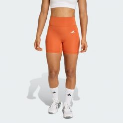 Krótkie legginsy Optime Essentials Workout. Brązowe legginsy Adidas, bez wzorów, z podwyższonym stanem, krótkie. Za 179.00 zł.