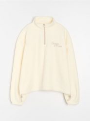 Bluza crewneck z napisem - kremowy. Białe bluzy Sinsay, l, bez wzorów, bez kaptura. Za 49.99 zł.