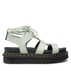 Sandały Dr. Martens. Białe sandały Dr. Martens, bez wzorów, bez obcasa, na płaskiej podeszwie, bez zapięcia. Za 439.99 zł.