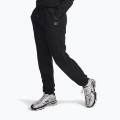 Spodnie damskie Under Armour Sport Terry Jogger /. Czarne spodnie sportowe Under Armour, bez wzorów, na fitness i siłownię. Za 159.99 zł.