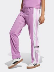Adidas Spodnie dresowe w kolorze jasnoróżowo-białym rozmiar: M. Białe spodnie dresowe Adidas, m, bez wzorów, z dresówki. Za 175.26 zł.