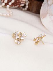 Pierres de Jade Pozłacane kolczyki-wkrętki z cyrkoniami rozmiar: onesize. Białe kolczyki Pierres de Jade, z cyrkonią, pozłacane. Za 56.99 zł.