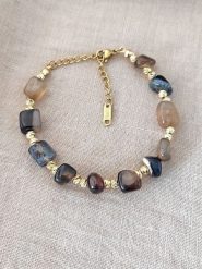 Nakkash Pozłacana bransoletka z agatami rozmiar: onesize. Brązowe bransoletki Nakkash, z agatem, pozłacane. Za 34.99 zł.