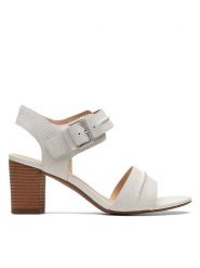 Clarks Skórzane sandały "KarseaHi Seam" w kolorze białym na obcasie rozmiar: 37,5. Białe sandały Clarks, bez wzorów, ze skóry, z otwartym noskiem, bez obcasa, na koturnie, bez zapięcia. Za 146.85 zł.