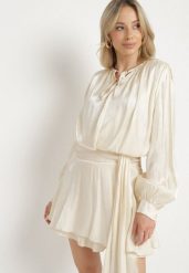 Beżowa Wiskozowa Sukienka Ozdobiona Wiązaniem i Falbanką Rallio. Brązowe sukienki Born2be, na co dzień, l, z aplikacjami, z jeansu, eleganckie, bez kołnierzyka, bez ramiączek, mini, proste. Za 139.99 zł.