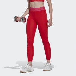 Legginsy damskie adidas Techfit. Czerwone legginsy Adidas, l, bez wzorów, z materiału. W wyprzedaży za 163.45 zł.