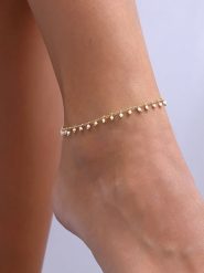 Luja Bijoux Pozłacana bransoletka z kryształami na kostkę rozmiar: onesize. Białe bransoletki Luja Bijoux, z kryształem, pozłacane. Za 74.81 zł.