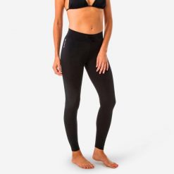 Legginsy UV surfingowe damskie Olaian 100. Czarne legginsy OLAIAN, s, bez wzorów, z elastanu. W wyprzedaży za 49.99 zł.