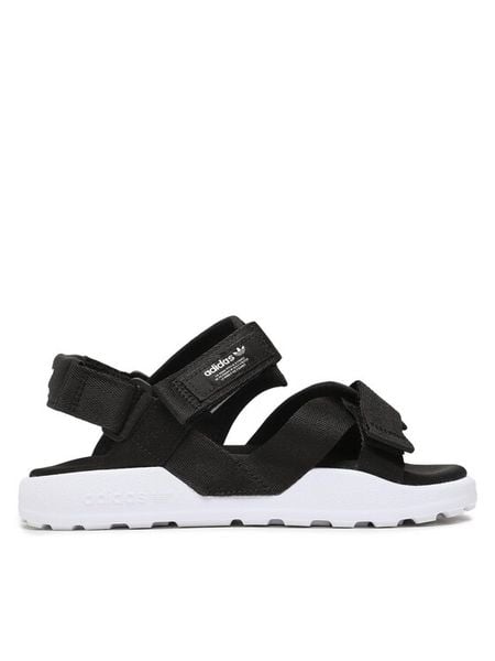 Adidas Sandały Adilette Adventure Sandals HP2184 Czarny. Czarne sandały Adidas, bez wzorów, z materiału, bez obcasa, na płaskiej podeszwie, bez zapięcia. Za 299.99 zł.