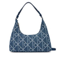 Torebka Calvin Klein. Niebieskie torebki klasyczne Calvin Klein, bez wzorów, z denimu, bez dodatków. Za 489.99 zł.