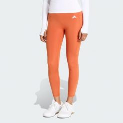 Legginsy 7/8 bez szwu z przodu Optime Essentials. Brązowe legginsy Adidas, bez wzorów. Za 219.00 zł.