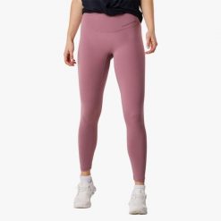 Długie legginsy treningowe damskie Swedemount Core Wrap szybkoschnące. Fioletowe bielizna sportowa SWEDEMOUNT, l, bez wzorów, z tkaniny, długie. Za 125.00 zł.