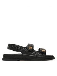 Nine West Sandały V1557-703-1 Czarny. Czarne sandały Nine West, bez wzorów, z materiału, bez obcasa, na płaskiej podeszwie, bez zapięcia. Za 279.99 zł.