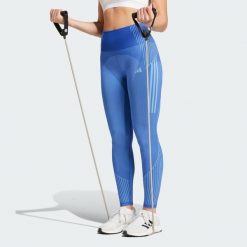 Legginsy Seamless Branded 7/8. Niebieskie legginsy Adidas, xs, bez wzorów, z materiału. Za 206.05 zł.