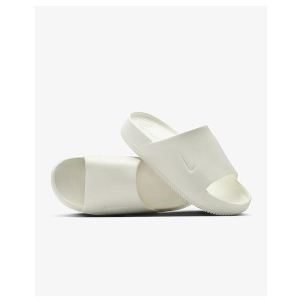 Klapki damskie Nike Calm. Białe klapki Nike, bez wzorów, bez obcasa. Za 176.99 zł.