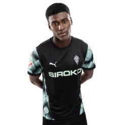 Oficjalna koszulka piłkarska Puma dla dorosłych Real Sporting de Gijón Footba. Czarne bluzki Puma, bez wzorów, sportowe, bez kołnierzyka, bez ramiączek. W wyprzedaży za 253.00 zł.