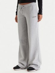 Guess Jeans Spodnie dresowe W6RB52 K68I4 Szary Regular Fit. Szare spodnie dresowe Guess Jeans, l, z aplikacjami, z bawełny. Za 299.99 zł.